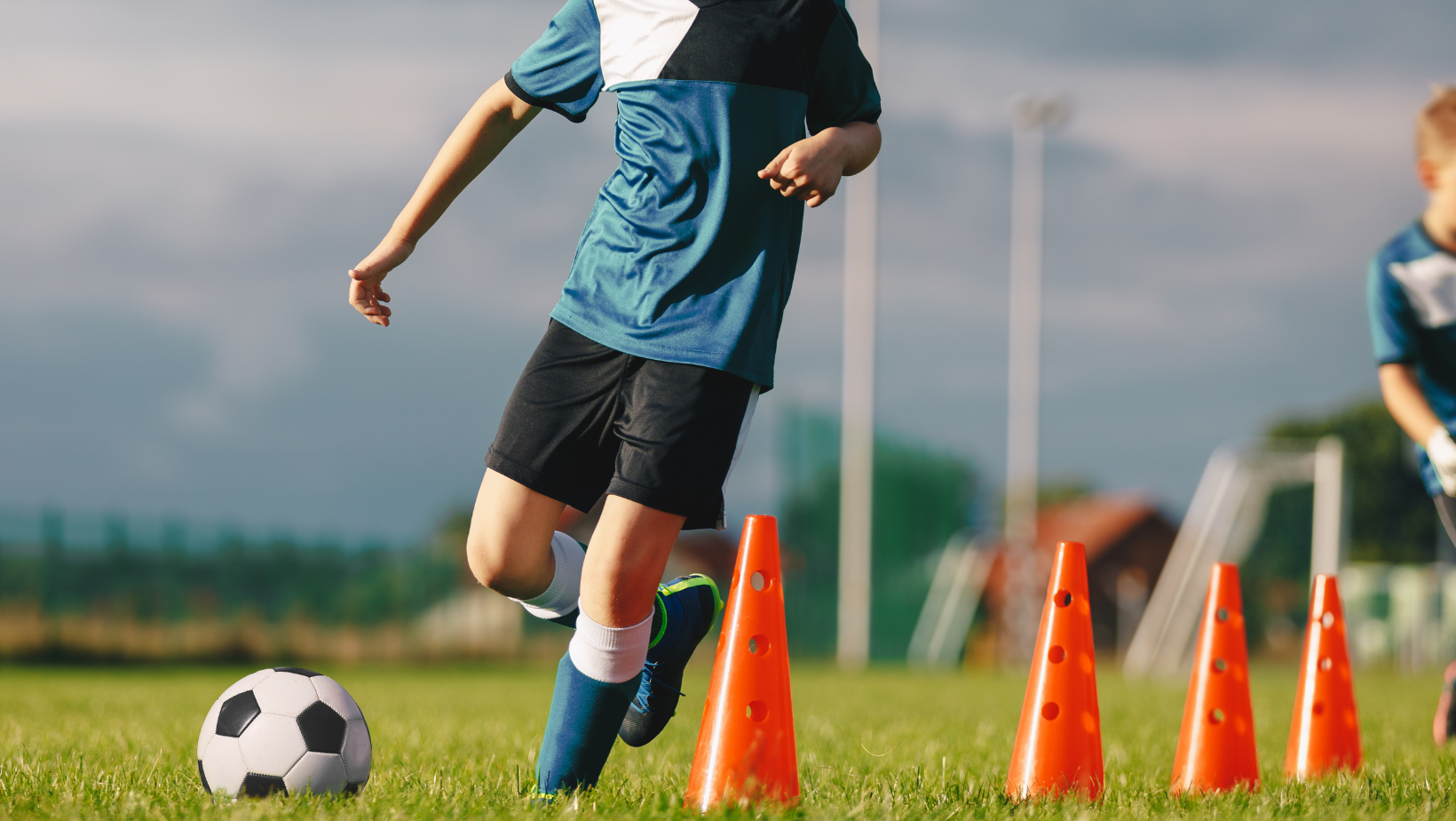 Boy playing soccer